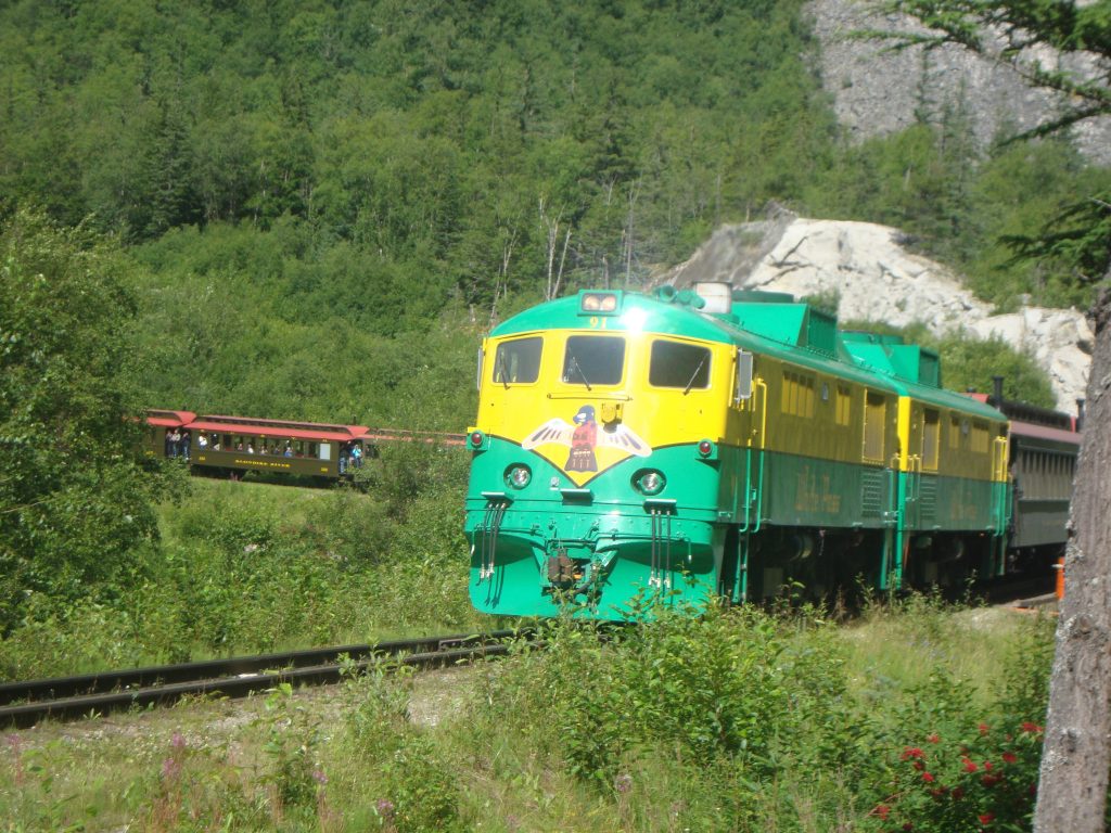 Green Train through mountains