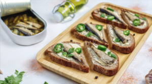 Open fish sandwiches with sprats, a small tinned fish